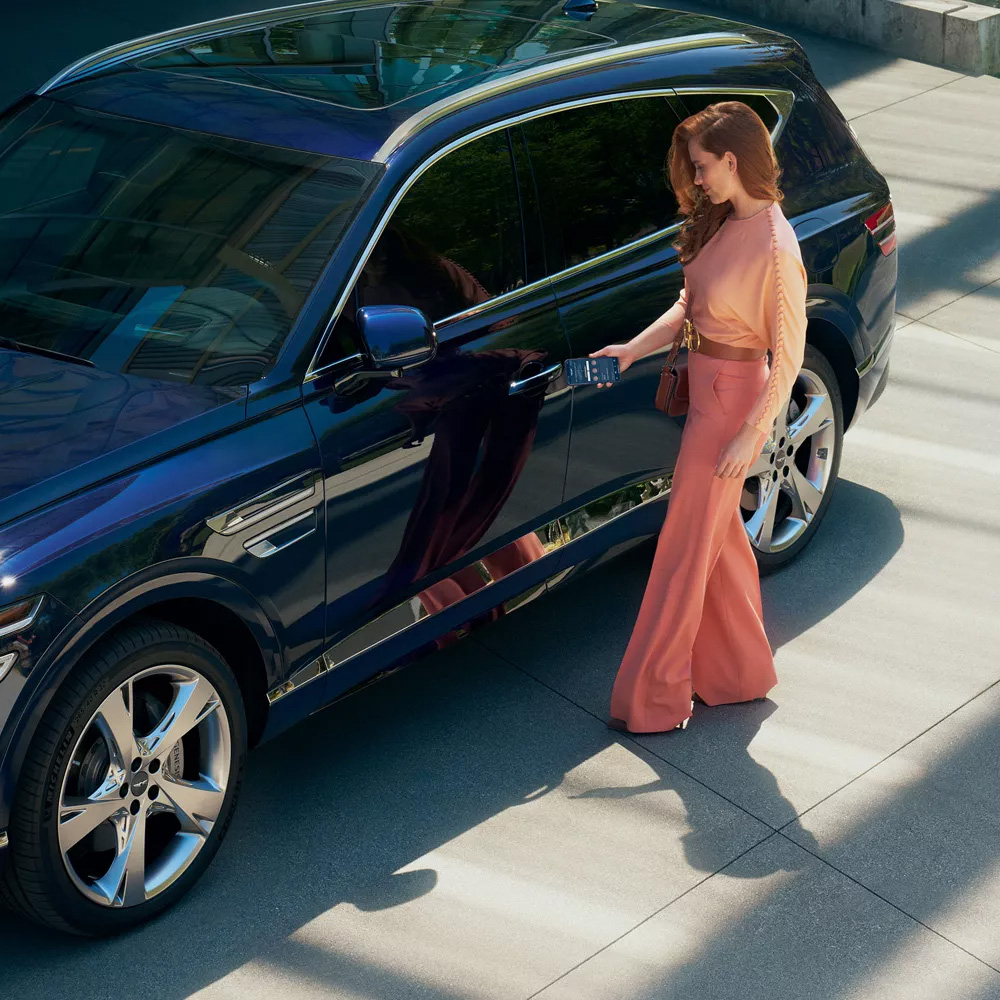 Experience the sophisticated allure of the Genesis GV80's distinctive design, as it graces the streets of Brunswick, NJ, blending dynamic tension with elegant beauty to redefine luxury in every curve.