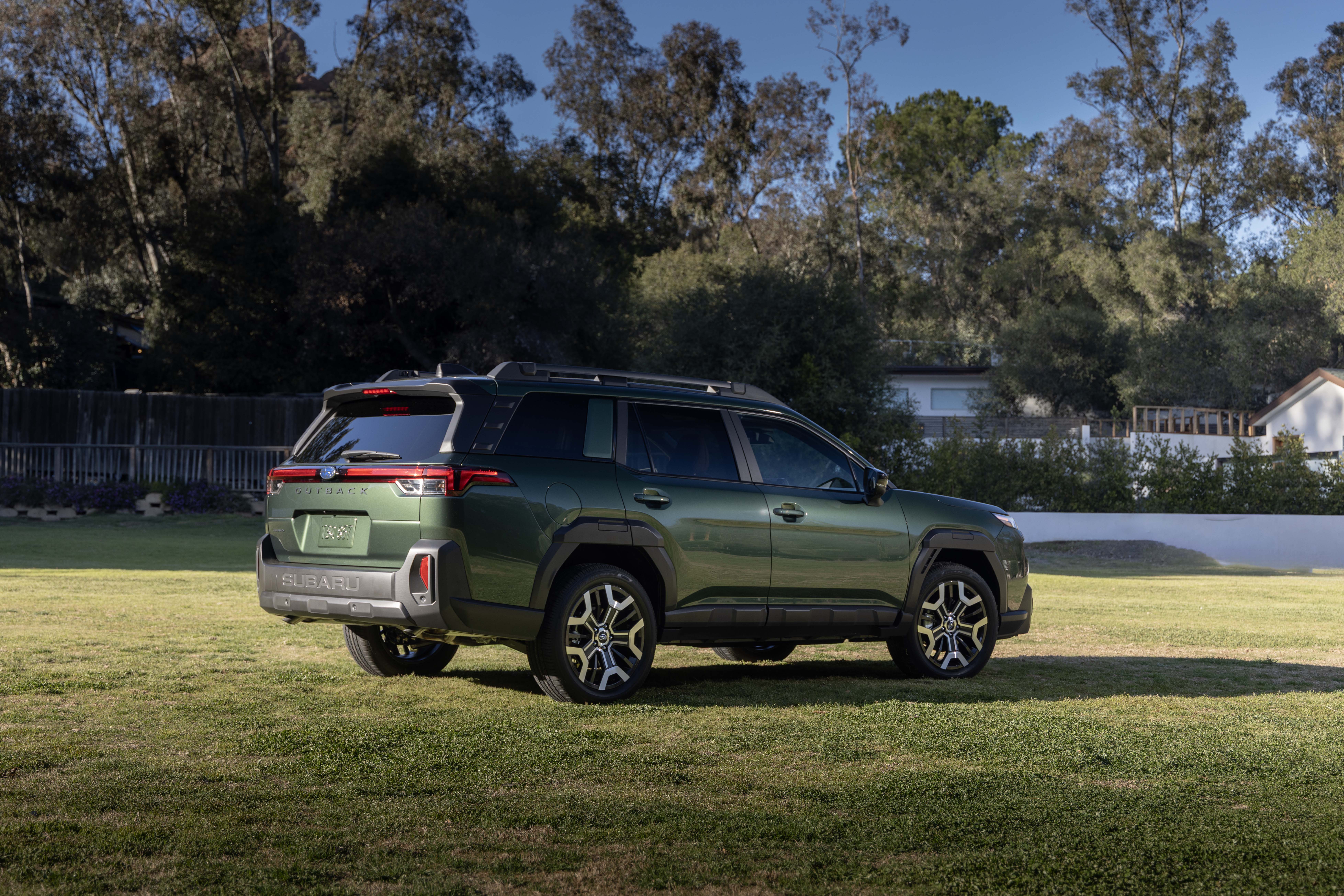 2026 Subaru Outback rear three-quarter exterior view in green, North Fort Lauderdale Subaru lease deals, 2026 Outback Fort Lauderdale offers, Subaru Outback green rear view, shop Subaru Outback now, Fort Lauderdale Subaru promotions, Outback adventure SUV, North Fort Lauderdale Subaru specials, 2026 Outback financing FL, Subaru Outback rear design