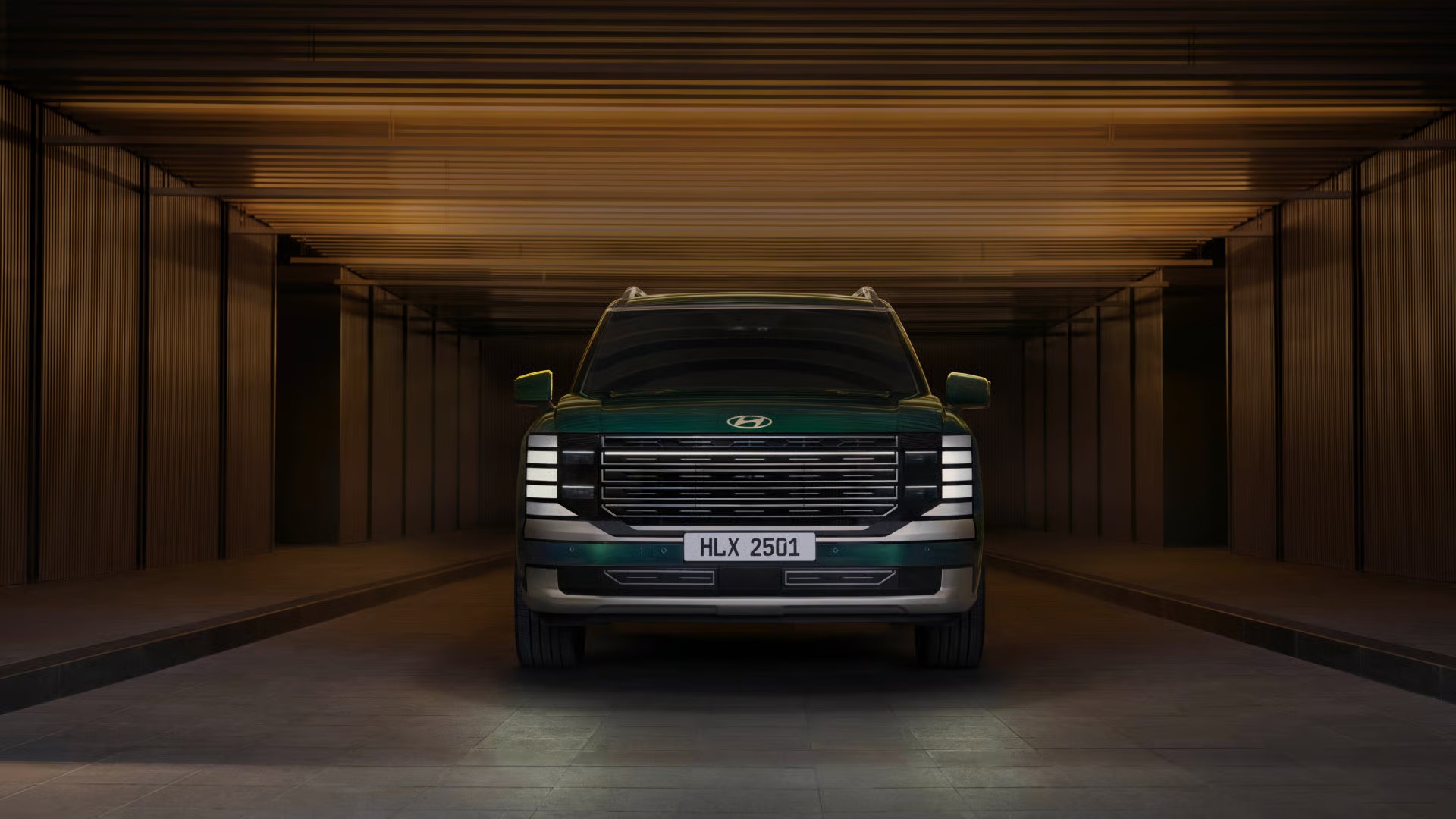 2026 Hyundai Palisade front three-quarter with vertical DRLs and wide grille at AutoFair Hyundai of Manchester