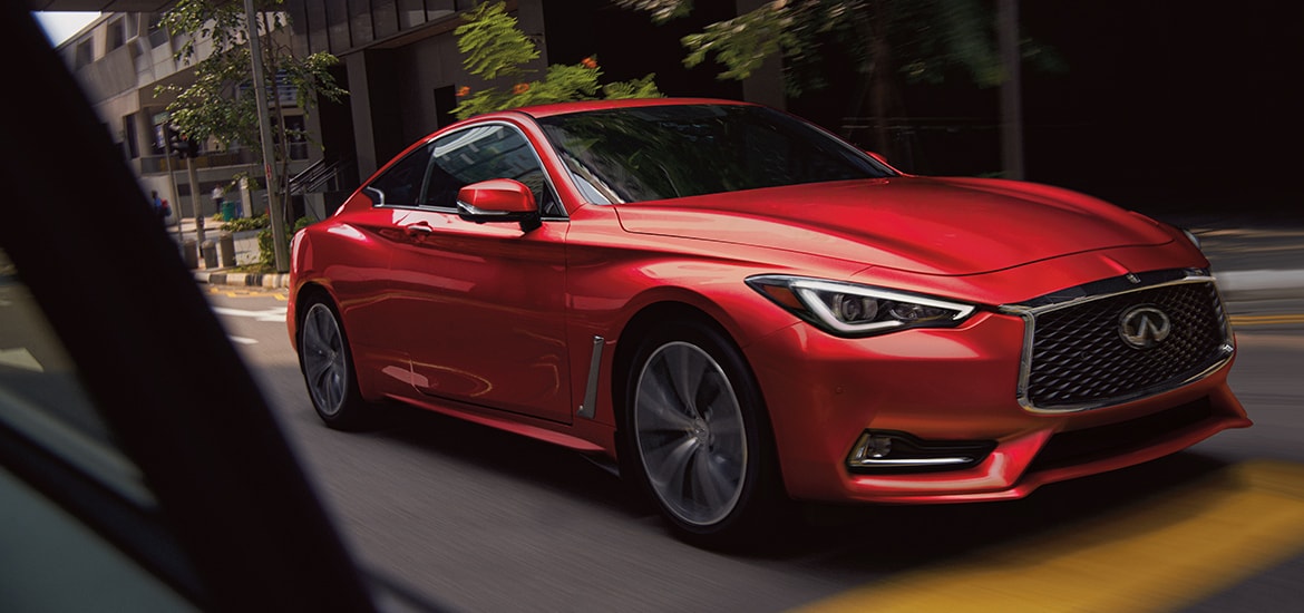 INFINITI Q60 safety, blind spot monitoring, predictive collision warning, adaptive steering system, Intelligent All Wheel Drive, winter driving safety, sunset driving visibility, front rear sensors, emergency braking system, advanced safety features