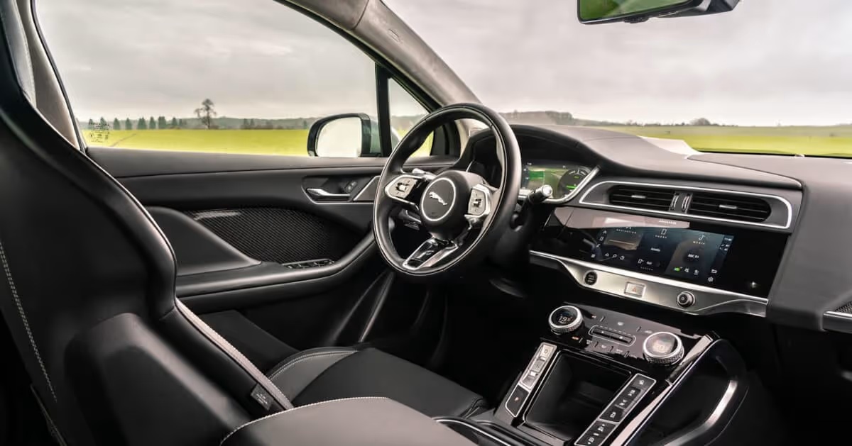 Jaguar I-PACE Naples FL, Coastal Winter EV, I-PACE 246 mile range, buy I-PACE Florida, I-PACE charging Naples, EV cabin pre-conditioning, luxury EV for Naples, I-PACE electric elegance, I-PACE home charging 11kW, Jaguar EV dealer Naples, I-PACE 90 kWh battery, I-PACE regenerative braking, I-PACE R-Dynamic price, I-PACE sleek design, I-PACE dual touchscreen.