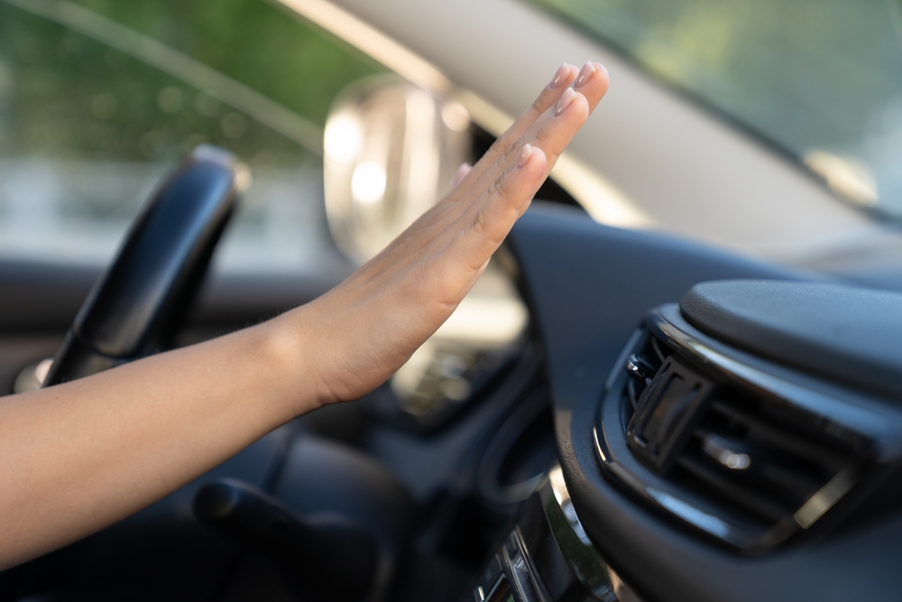 Audi AC blowing warm air, weak airflow Audi vents, Audi climate control problem Naples FL, Audi AC repair needed, AC not cooling luxury car, hot air Audi dashboard vents, Naples Audi service for AC performance issues