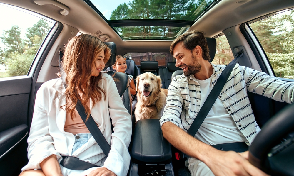Audi cabin AC comfort, cool Audi interior Naples FL, family driving Audi with working AC, summer drive Audi Naples Florida, happy family in cool car, luxury car air conditioning Florida climate, Audi AC success story Naples