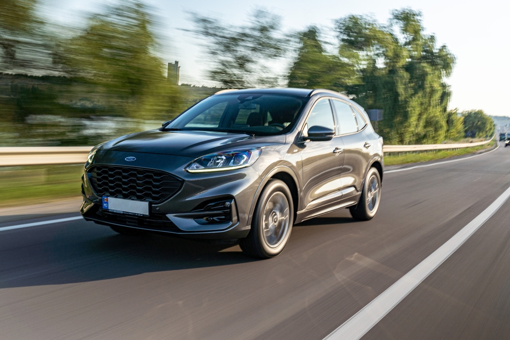 2025 Ford Escape driving on highway, compact SUV near Haverhill MA, new Ford Escape crossover, Ford Escape gas mileage comparison, Ford Escape lease AutoFair Haverhill, Ford Escape vs Focus, Ford Escape hybrid Haverhill, compact SUV test drive Ford dealer Massachusetts