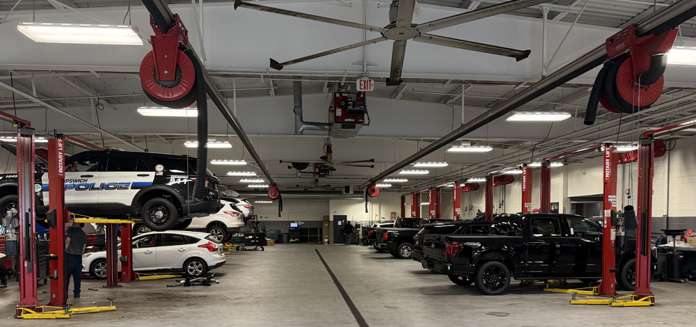 Heavy-duty commercial bays at AutoFair Ford of Haverhill servicing Ford Transit vans for delivery and contractor fleets