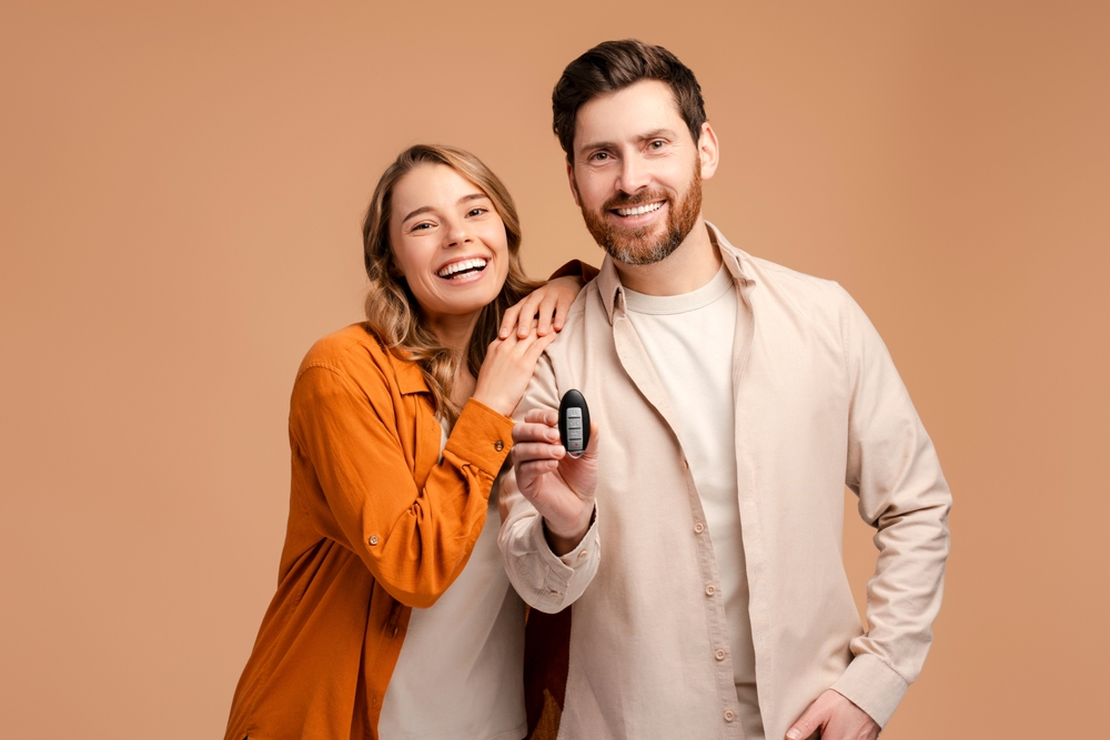 Happy couple approved for bad credit car loan in Manchester NH, AutoFair financing for low credit score, car loan approval after bankruptcy or no credit, easy auto financing New Hampshire