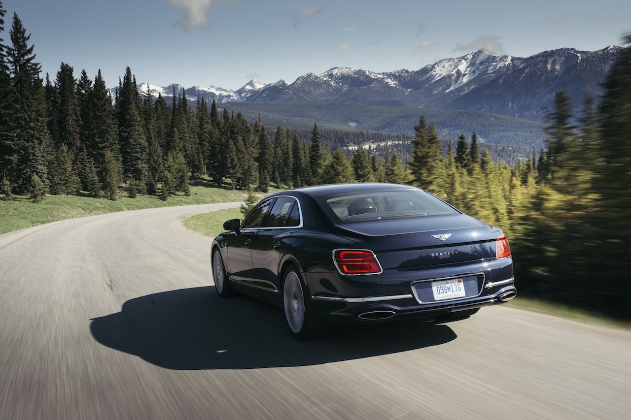 Bentley Flying Spur rear view on a mountain drive
