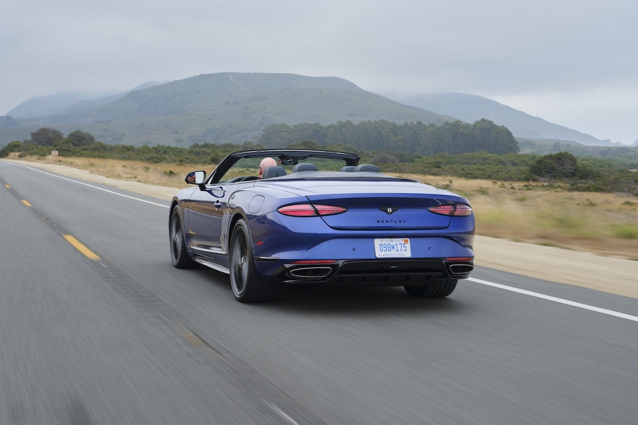 Bentley Continental GTC S rear three-quarter driving shot near Naples, FL