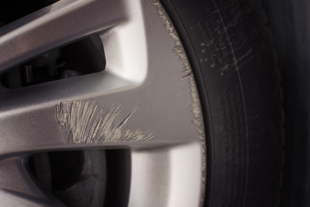 BMW rim curb rash, detailed wheel damage Freeport NY, curb rash scratch Nassau County, BMW alloy repair before Hamptons trip, visible wheel damage BMW service Long Island