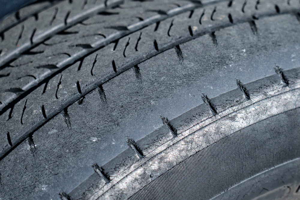 BMW tire wear misalignment Freeport NY, uneven tread BMW tires Nassau County, tire alignment damage BMW Freeport, BMW tire inspection service Long Island, back to school tire check BMW, BMW tire safety signs
