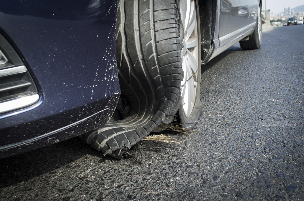 summer tire blowout Georgia, Conyers Nissan emergency tire failure, highway tire damage Georgia heat, blown tire summer road trip, Georgia tire failure roadside risk, Nissan tire check Conyers service center