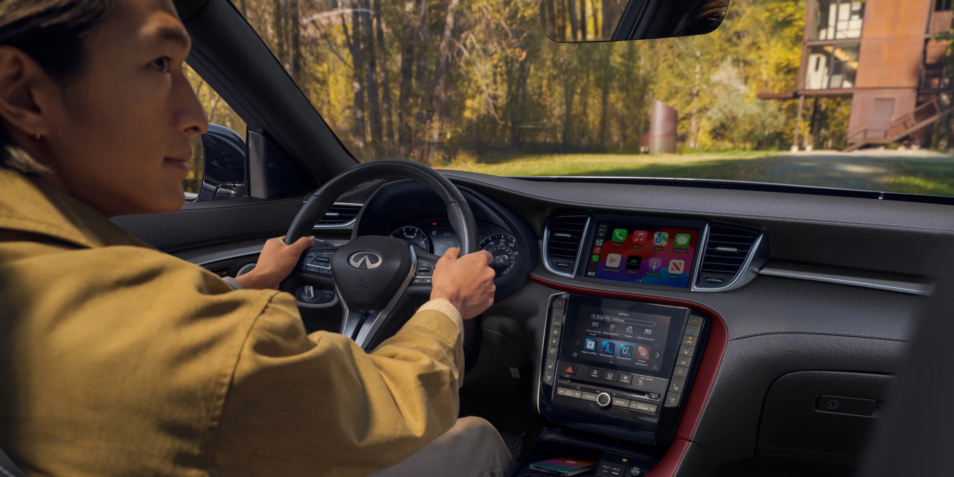 2025 INFINITI QX50 interior, INFINITI of Cool Springs, Franklin TN INFINITI dealership, INFINITI Bluetooth system, luxury climate control, summer driving comfort, INFINITI QX50 dual-zone A/C, Tennessee heat driving, INFINITI dashboard cooling technology, premium car infotainment Cool Springs