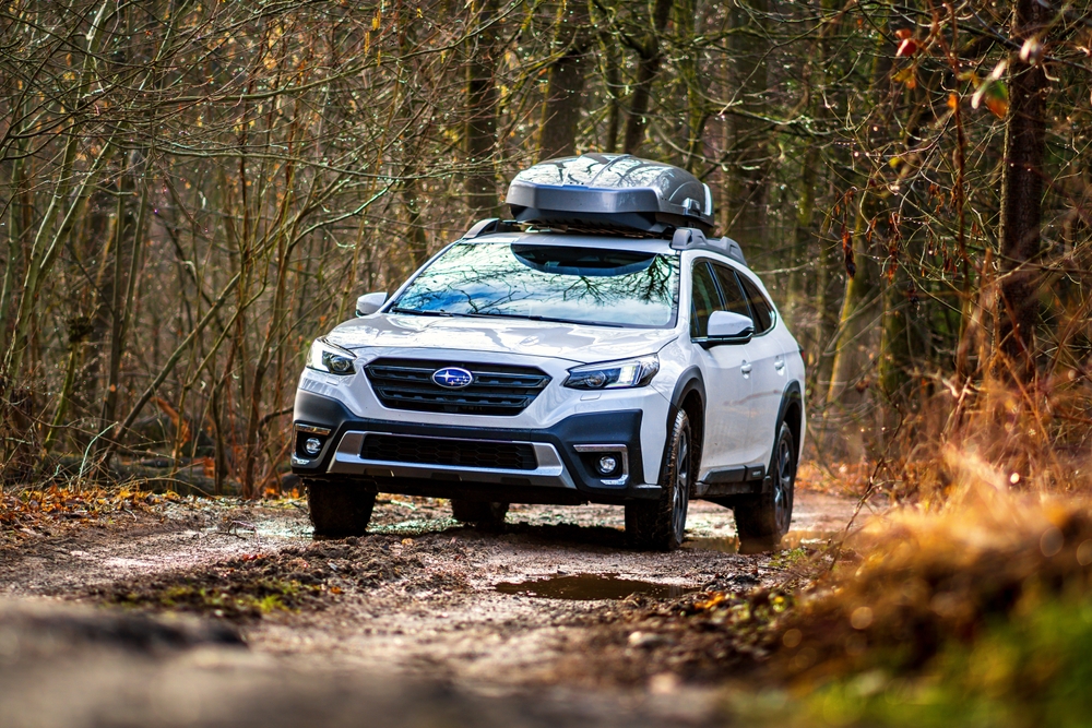 Certified Pre-Owned Subaru Outback driving off-road near Haverhill MA, CPO Subaru for adventure in Merrimack Valley, Subaru Symmetrical All-Wheel Drive in New England winter conditions, used Subaru SUVs Haverhill, CPO Subaru deals Massachusetts