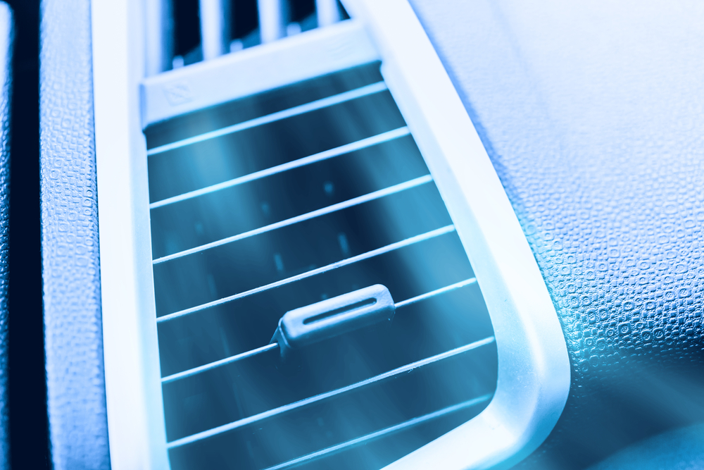 Mazda dashboard air vent with cold airflow, car air conditioning system, A/C blowing cool air, Mazda interior air vent Florida, cool air Mazda summer driving, Daytona Beach Mazda air conditioning service, interior A/C Mazda Florida heat