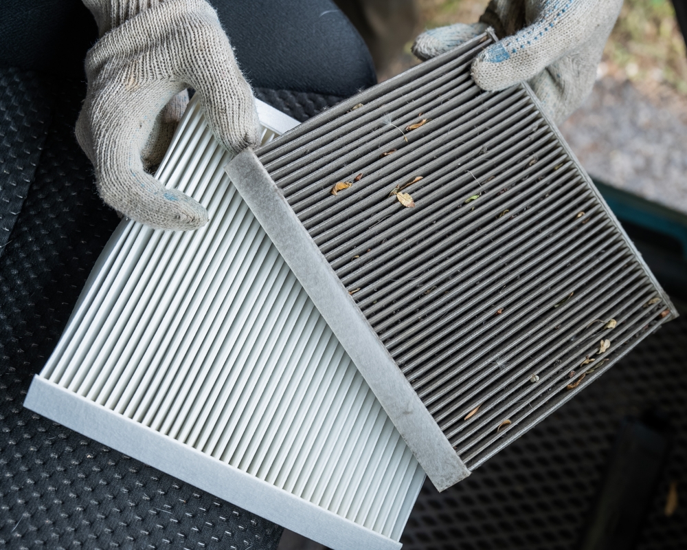 Nissan cabin air filter replacement Charlotte, clogged AC filter East Charlotte Nissan, dirty vs clean air filter comparison, Nissan air conditioning fix Charlotte NC, pollen buildup car AC filter