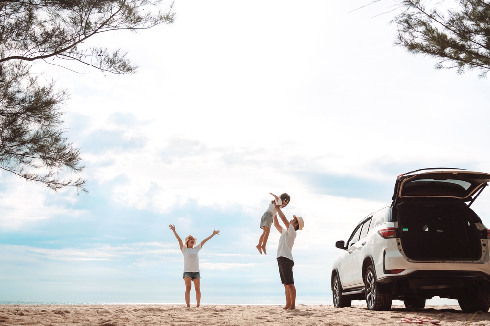 family road trip summer Nissan SUV, beach travel with new tires, Georgia vacation tire check, summer tire alignment before road trip, Stone Mountain Nissan road trip prep, hot weather tire safety for families