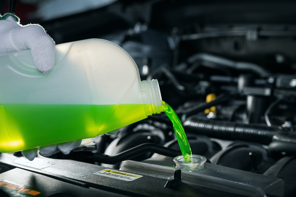 Ford cooling system maintenance Franklin TN, coolant check Ford F-150 summer, green antifreeze radiator Ford Explorer, coolant flush service Ford Bronco Tennessee heat, overheating prevention Ford trucks, coolant refill Franklin Ford service, hot weather cooling system inspection Ford SUV