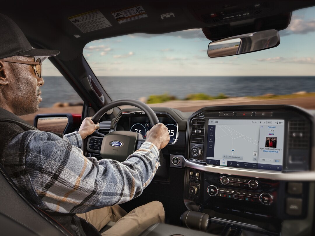 Ford Lincoln of Franklin F-150 SYNC navigation system, Ford SYNC 4 touchscreen update Franklin TN, driver using Ford infotainment system, Ford truck Apple CarPlay connection Tennessee, Bluetooth troubleshooting Ford F-150, Ford service Franklin TN SYNC diagnostics, SYNC software update Ford pickup, SYNC navigation map Franklin