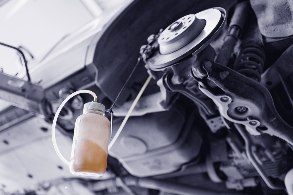 Brake fluid moisture test and flush, hygroscopic fluid replacement DOT-approved, restore stopping power on icy roads, Franklin TN brake service, winter safety for Ford vehicles, ABS performance, dealership technicians, Ford service specials, Tennessee cold weather prep, Ford of Franklin