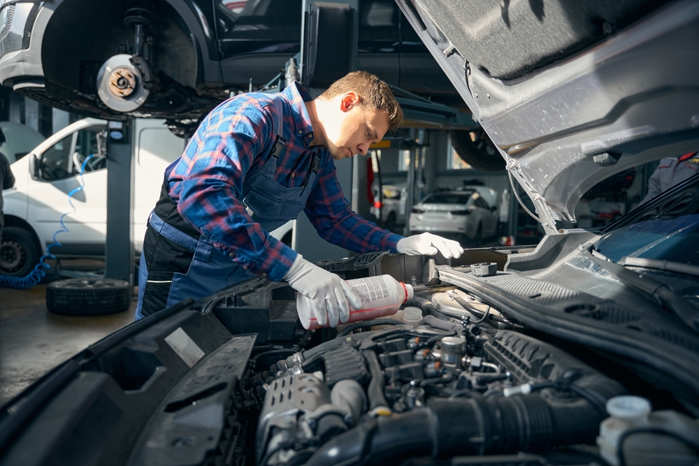 Coolant antifreeze check for Ford vehicles, 50/50 mix Motorcraft coolant, prevent frozen engine block, Tennessee winter fluid service, Franklin TN coolant flush, radiator protection, overheating prevention, Ford certified technicians, winter vehicle prep, Ford of Franklin