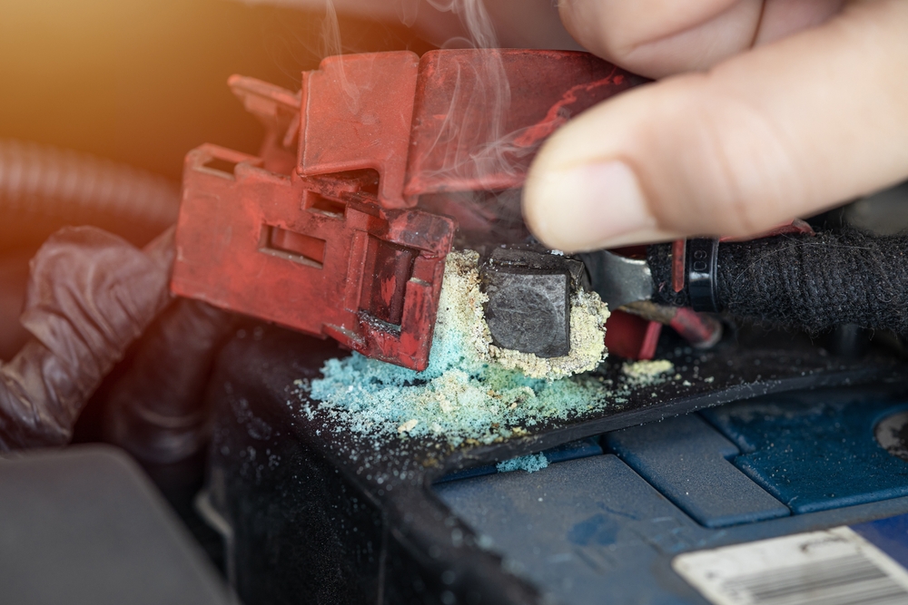 Battery corrosion buildup Murfreesboro Ford service, green and blue corrosion Ford battery terminal, heat damaged car battery connection, Ford of Murfreesboro battery replacement corrosion, warning signs bad battery Tennessee heat, battery maintenance summer TN