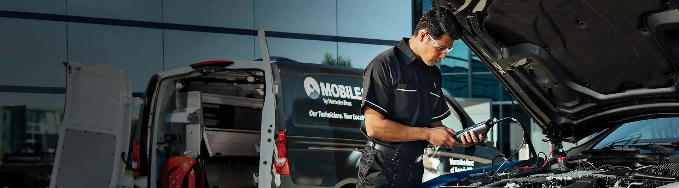 Close-up of Mercedes-Benz battery diagnostic tester, AGM battery test Long Island, Mercedes-Benz service Massapequa Amityville, professional battery voltage check, Mercedes alternator and battery analysis