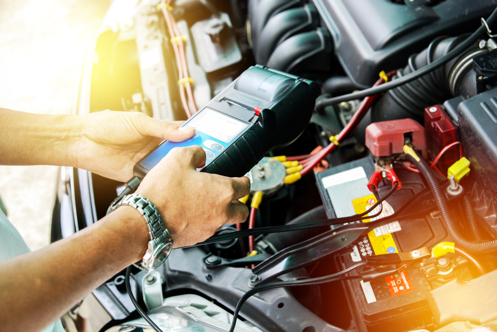 Professional INFINITI battery diagnostic testing, Cool Springs expert car service, battery testing Franklin TN, advanced load test equipment, INFINITI OEM battery check, Tennessee summer battery inspection, avoid battery failure with precision diagnostics, car maintenance heat stress testing