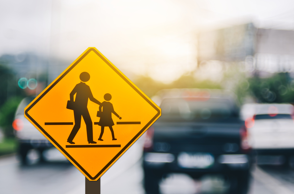 School zone traffic sign Franklin TN, Cool Springs back-to-school driving safety, INFINITI brake service for school zones, Tennessee school crossing traffic sign, school zone slowdown reminder INFINITI drivers, Franklin driving near schools