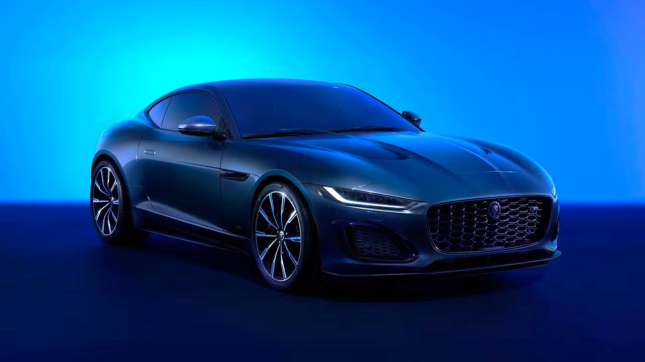 Jaguar F-TYPE coupe sports car, sleek design, luxury performance, modern headlights, Jaguar vs Porsche comparison, Jaguar sports car review, Jaguar F-TYPE features, Jaguar F-TYPE design, Jaguar F-TYPE performance, luxury coupe Jaguar