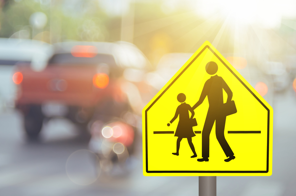 school zone driving warning Cornelius NC, INFINITI brake inspection for school safety, Lake Norman back to school vehicle safety, prepare for crosswalk stops, INFINITI driver safety near schools, child pedestrian warning signs