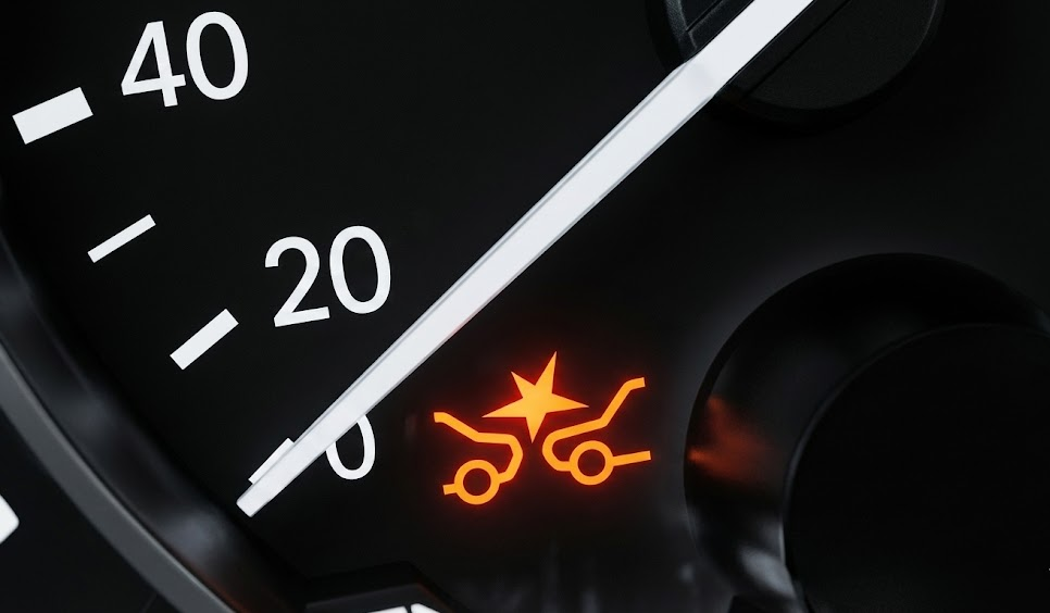 collision warning light on modern Nissan-style dashboard, McDonough Nissan Safety Shield 360 alert, Automatic Emergency Braking warning icon, forward collision warning system Henry County GA, dashboard symbol for chain reaction rear-end crash, Nissan ADAS safety technology display, highway driving safety alert near McDonough and Stockbridge, Nissan driver assistance features for deer season, brake assist and collision mitigation indicator, Nissan service center in Henry County Georgia