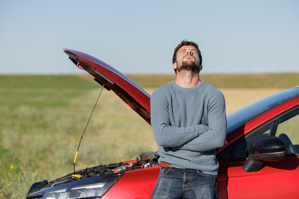 Stranded driver dead battery Georgia highway, Nissan battery failure summer heat, car won’t start McDonough GA, signs of battery breakdown, McDonough Nissan roadside battery issue