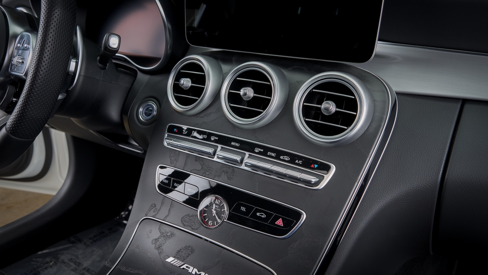 Mercedes-Benz dashboard A/C vents interior, luxury car air conditioning system, Mercedes AC control Daytona Beach, keep cool in Florida summer, certified Mercedes-Benz air conditioning service, Mercedes-Benz A/C performance check Daytona, cooling system comfort Mercedes-Benz