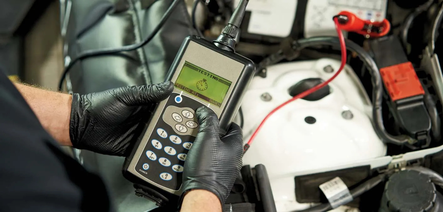 Close-up of Mercedes-Benz battery diagnostic tester, AGM battery test Long Island, Mercedes-Benz service Massapequa Amityville, professional battery voltage check, Mercedes alternator and battery analysis