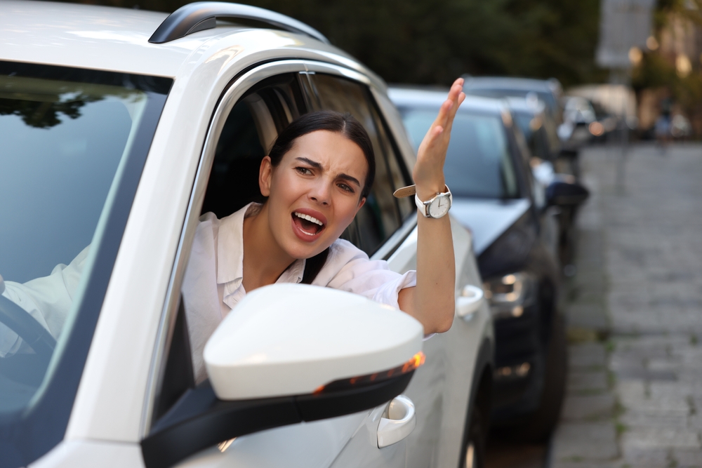 Frustrated Mercedes-Benz driver in Long Island traffic, luxury car discomfort heatwave, Massapequa driver upset A/C not working, Mercedes climate control failure Nassau County, summer traffic Mercedes-Benz driver angry, Mercedes-Benz of Massapequa cooling system service