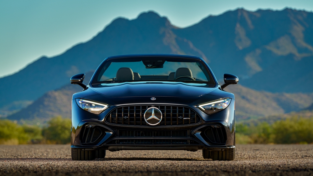 Mercedes-AMG biturbo front view with mountains, turbocharged Mercedes performance at altitude, Westminster Colorado engine tuning, premium 91 octane recommendation, intercooler and turbo boost efficiency, Mercedes-Benz high altitude service center, factory-certified diagnostics, genuine Mercedes parts, performance inspection for I-70 mountain trips