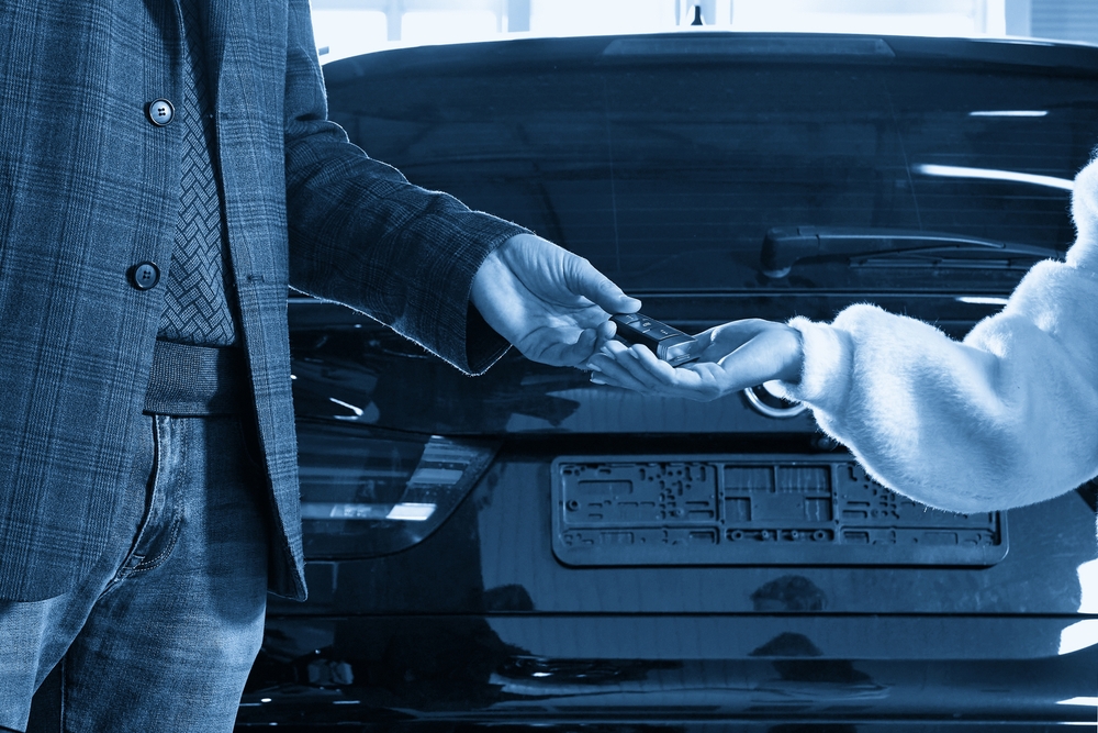 Mercedes-Benz dealership service bay, technician receiving vehicle key, Keyless-GO diagnostics and repair, Westminster Colorado certified Mercedes service, battery test and replacement, genuine Mercedes parts, schedule Keyless-GO service near Broomfield and Denver CO