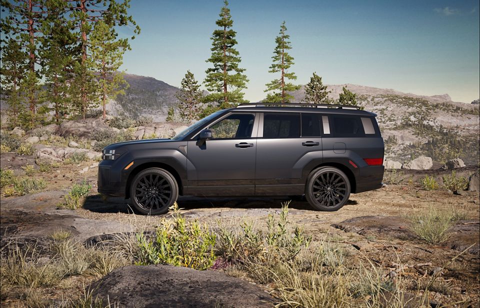 2025 Hyundai Santa Fe AWD in rugged Colorado terrain, winter Hyundai SUV for families Westminster, Hyundai Santa Fe snow traction Denver, AWD SUV with hybrid fuel efficiency Colorado, Hyundai Santa Fe ecotronic gray matte