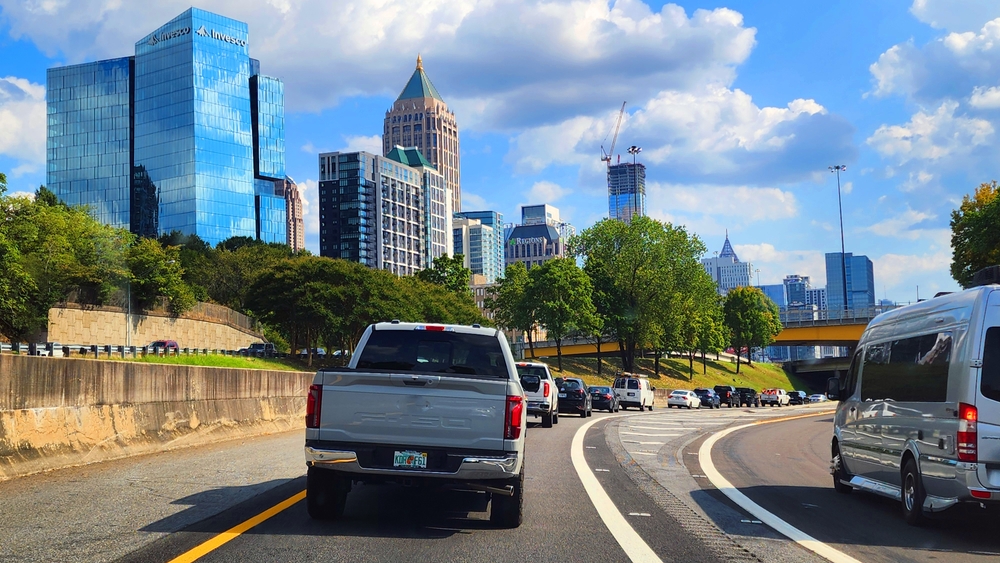 Atlanta I-85 traffic and stop-and-go driving, Georgia heat and congestion near Newnan GA, Jeep Grand Cherokee maintenance for severe service, engine oil change schedule, cooling system inspection, brake wear from city traffic, wheel alignment after potholes, Newnan CDJR Service center near Bullsboro Drive, Mopar parts and certified Jeep technicians