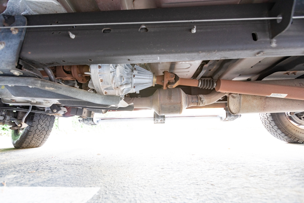 Ram 1500 differential and driveshaft underside, gear oil change interval for frequent towing, 4x4 axle service, Mopar fluids, severe service schedule Newnan GA, towing maintenance near I-85, Coweta County Ram truck service