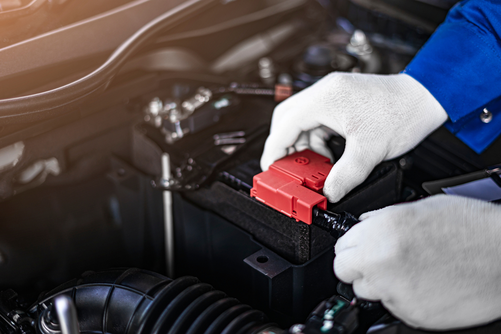 Nissan battery replacement service Conyers GA, OEM battery installation Georgia, certified technician testing Nissan battery, car battery maintenance Georgia summer, Nissan battery service near Atlanta, Conyers Nissan Service Center battery test