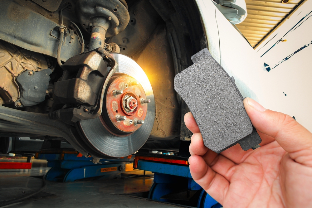 Nissan brake pad inspection Athens GA, worn brake pads, Nissan service near UGA, brake replacement Nissan Altima Rogue Pathfinder, brake rotor safety, Athens back-to-school car prep, certified Nissan brake technician Clarke County