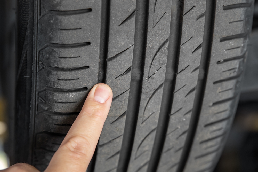 Nissan service tire inspection, tread depth, pressure check, brake inspection