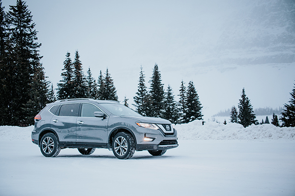 Nissan winter maintenance tips, best winter tires for Nissan, oil change for Nissan Altima, antifreeze for Nissan, windshield wipers, gas tank freezing prevention, heater check, emergency kit for winter driving, Colorado Springs Nissan service