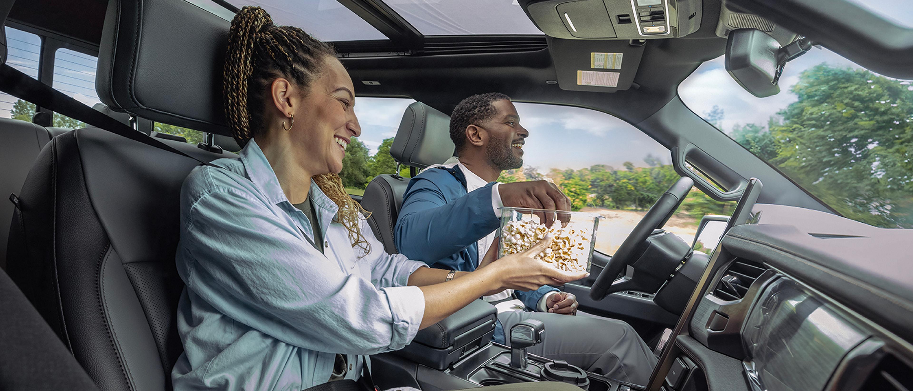 Ford F-150 Lightning interior with BlueCruise hands-free driving, driver-assist technology, software features via Ford Power-Up, EV comfort and technology package, Ford EV service Palm Bay FL, Lightning maintenance guide, Brevard County roads