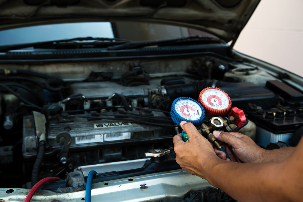 Nissan A/C service refrigerant check, Scott Clark Nissan Charlotte NC service center, Nissan AC pressure test, refrigerant refill Charlotte, Charlotte auto AC repair, summer maintenance for Nissan, fix AC near Ballantyne, professional auto service South Boulevard