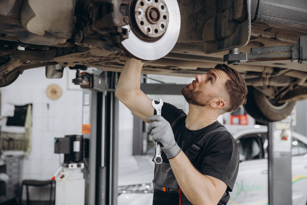 Volkswagen brake inspection Snellville GA, VW certified technician checking brake rotors, back to school VW service Stone Mountain Volkswagen, VW safety maintenance Gwinnett County, reliable VW stopping power school zone