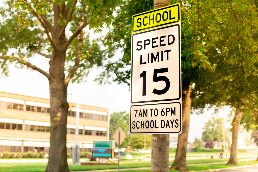 School zone speed limit sign Snellville GA, back to school driving safety Volkswagen, school speed enforcement Georgia, Stone Mountain VW safe driving tips, VW brake check for school zones