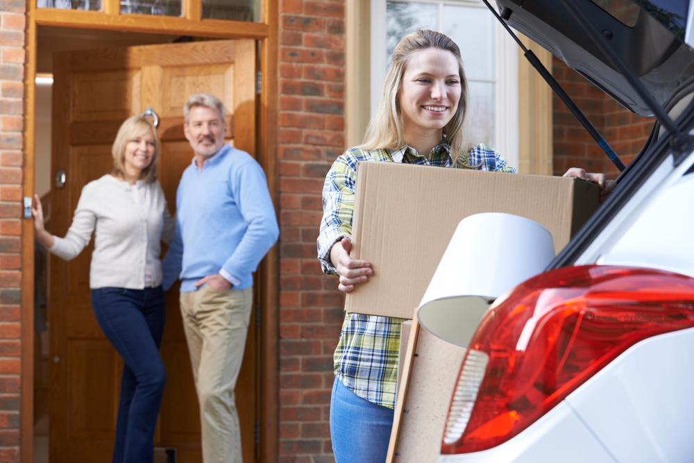 College student loading car for UGA move-in, Athens GA back to school auto prep, parents saying goodbye, car readiness for fall semester, Athens Collision Center vehicle maintenance for students