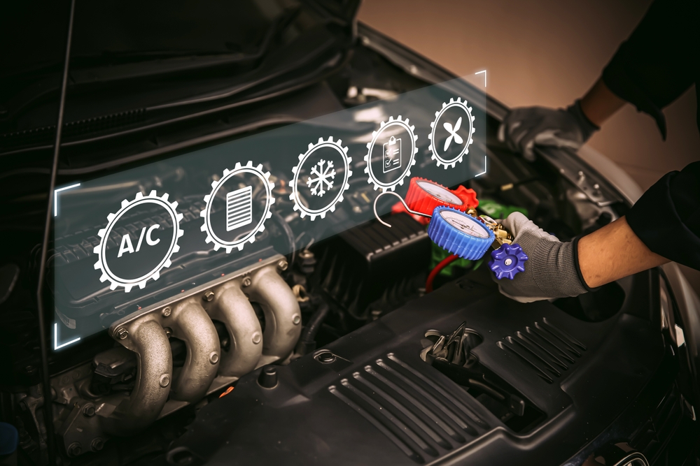 Nissan A/C repair Knoxville TN, vehicle air conditioning diagnostics, Ted Russell Nissan service center, summer car A/C checkup Knoxville, refrigerant pressure testing Nissan, AC system service Tennessee, automotive A/C repair Knoxville, Nissan AC diagnostic tools